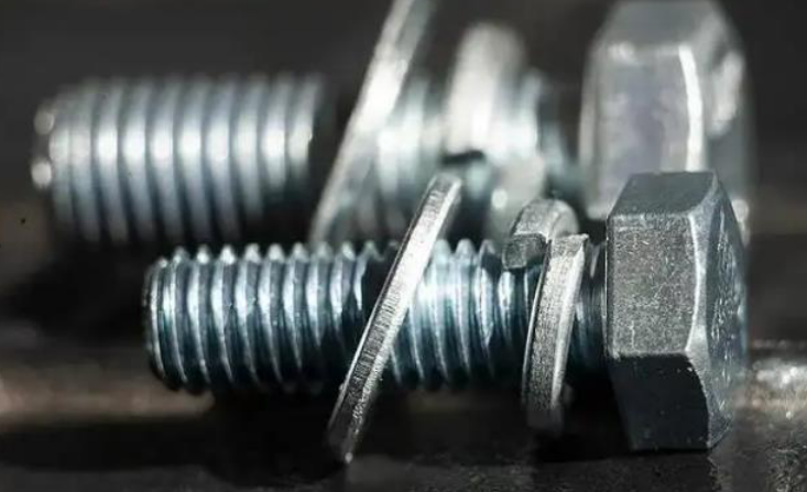 What are the respective functions of spring washers and flat washers?